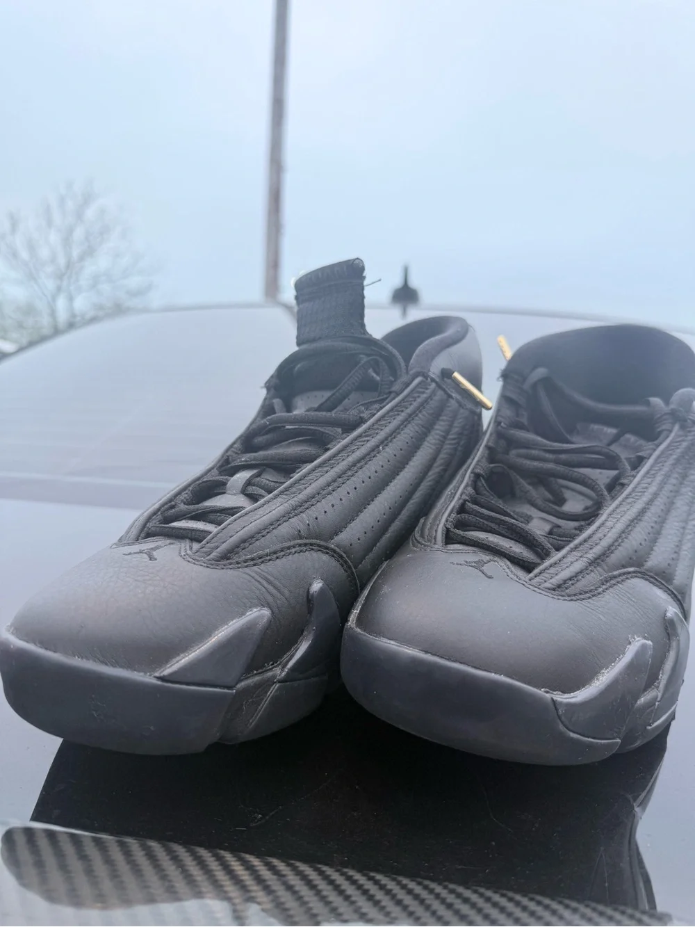 Men's Black Jordan’s Athletic Sneakers with Gold Accents